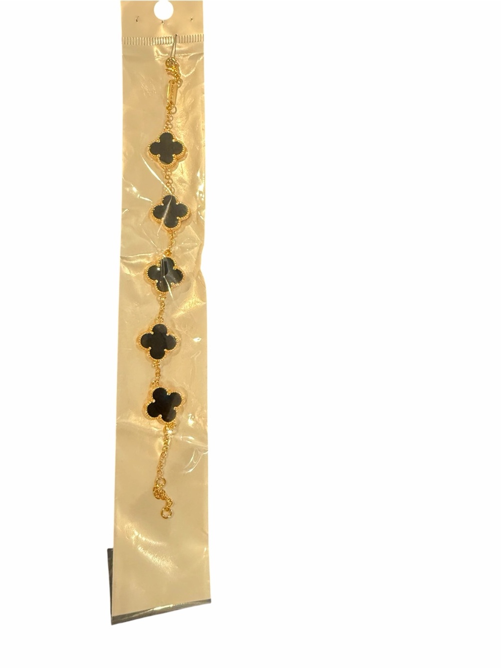 Gold-Tone Bracelet with Black Clover Links